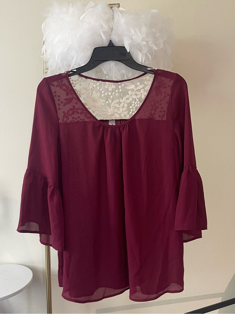 Beautiful flowing flared bell sleeves top with lace embroidered sheer back